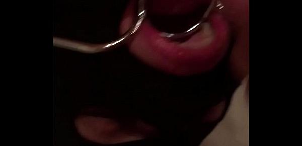  Hooded girlfriend with ring gag sucks cock for facial
